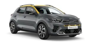 Mitcar Warszawa | Salon i Serwis KIA i Subaru | Szaro-żółta Kia stonic 2022 na białym tle.